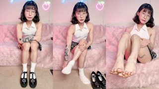 Cute, fit Asian girl shares her honest thoughts on foot fetishes and takes off her shoes and socks